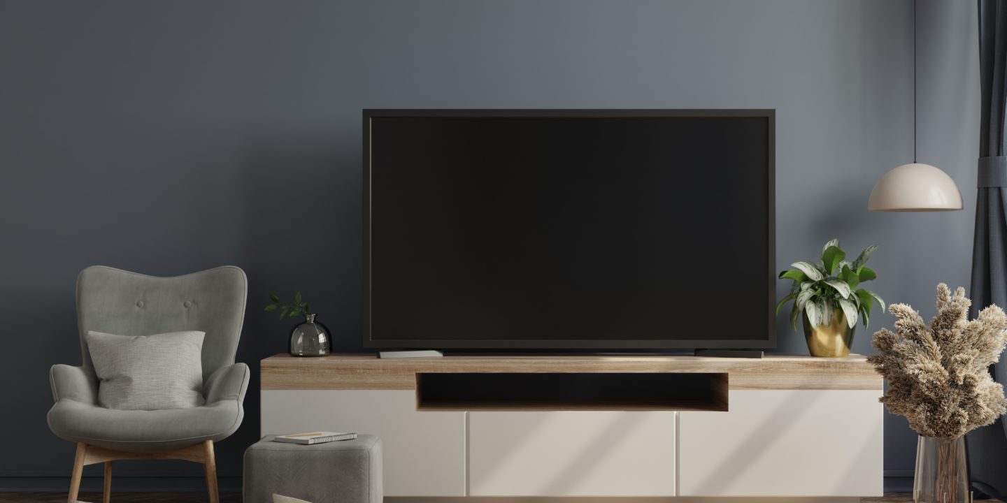 Mockup tv on cabinet in modern empty room with the dark wall.